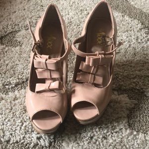 Mixx Shuz pink and tan high heel shoes